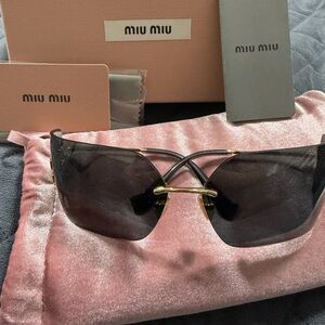 Miu Miu Gold and Black Sunglasses